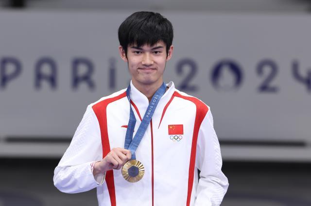 1722903949398047079.jpg 巴黎奥运会+_+射击——男子10米气步枪:中国选手盛李豪夺冠XxjpseC010016_20240729_MVPFN0A001.jpg